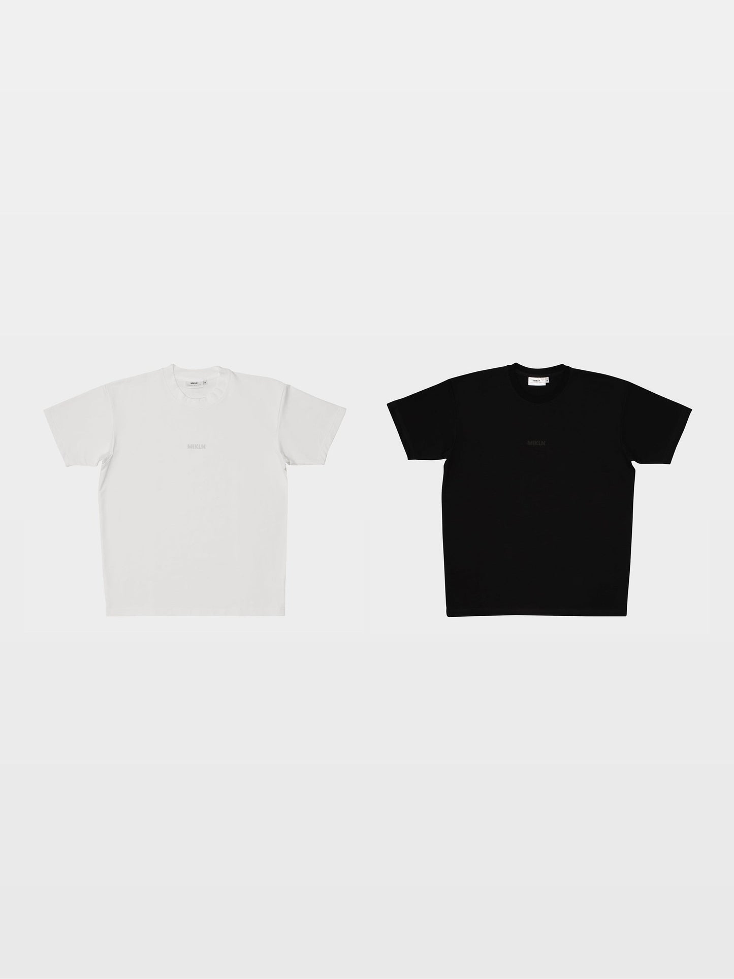 mikln duo-pack met twee original t-shirts in black en off-white, ton-sur-ton logo, handgemaakt in nederland