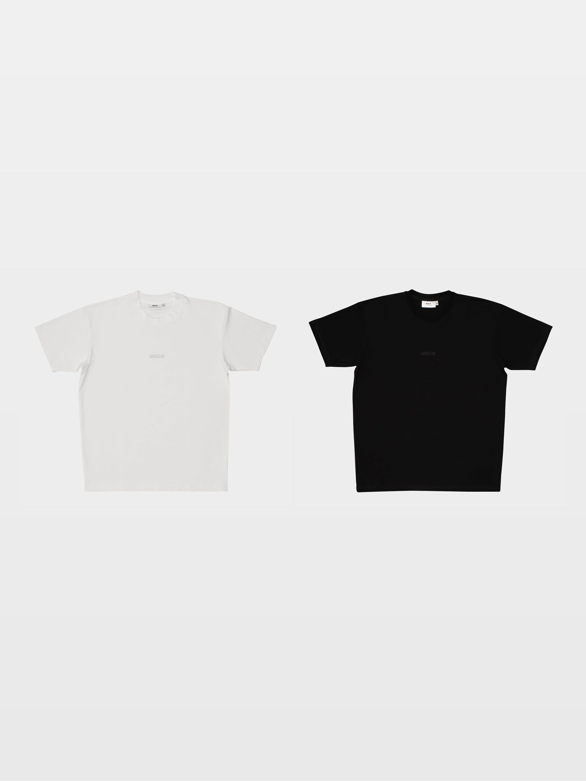 MIKLN duo-pack met twee Original T-shirts in black en off-white, ton-sur-ton logo, handgemaakt in Nederland
