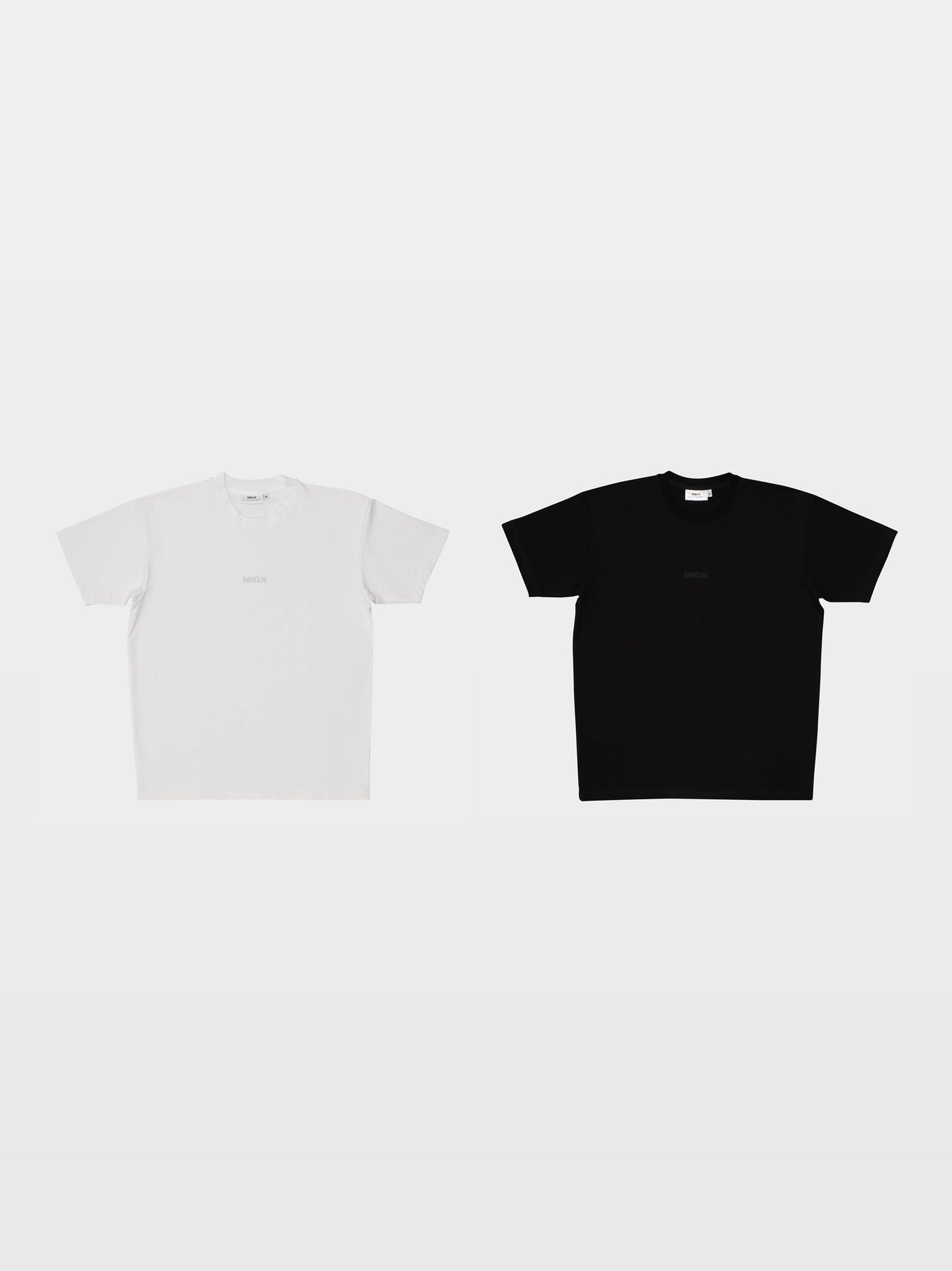 MIKLN duo-pack met twee Original T-shirts in black en off-white, ton-sur-ton logo, handgemaakt in Nederland
